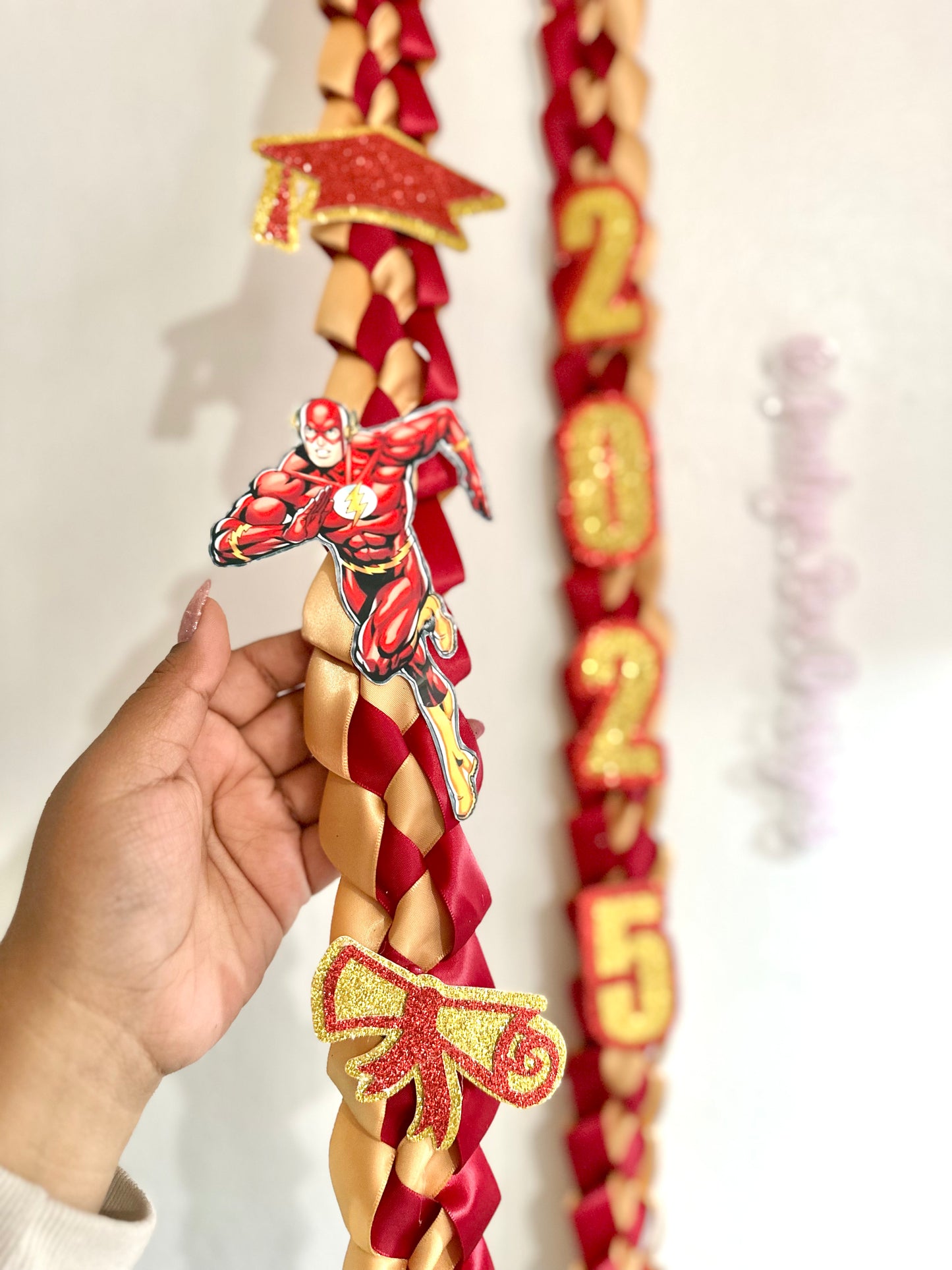 The Flash Graduation Lei