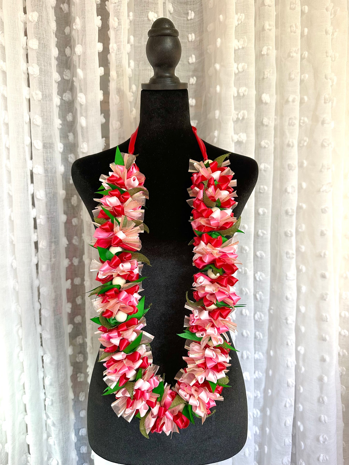 Pink and Red Pua Ribbon Lei