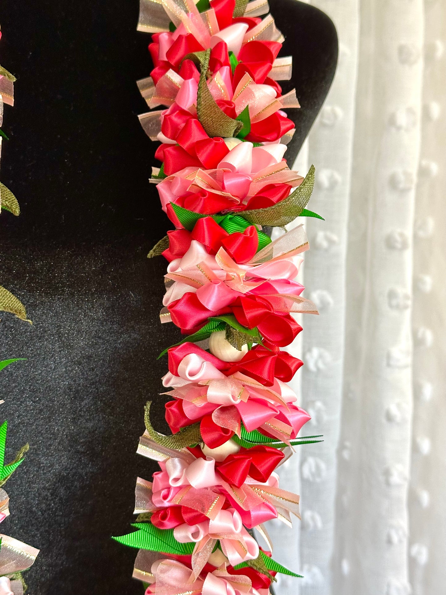 Pink and Red Pua Ribbon Lei